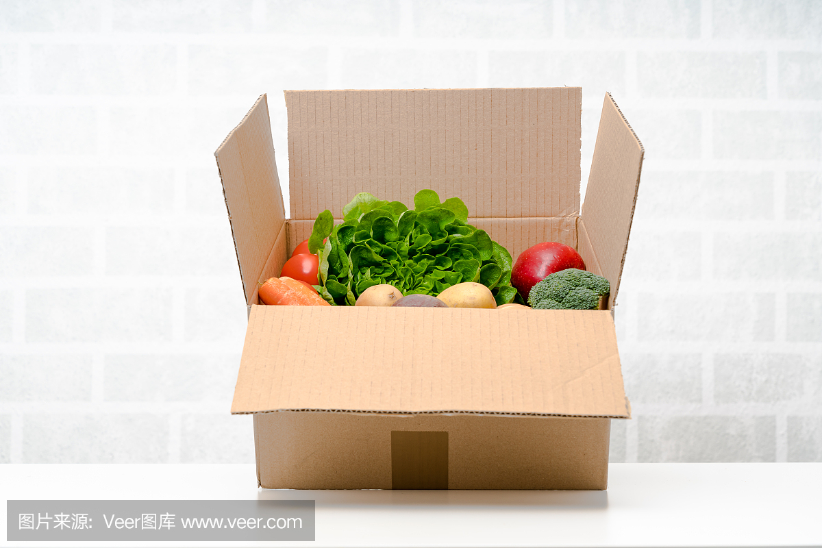 新鲜水果和蔬菜。蔬菜盒,快递盒。